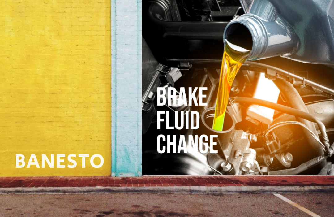 Create an image illustrating a mechanic changing brake fluid in a vehicle's brake system. The